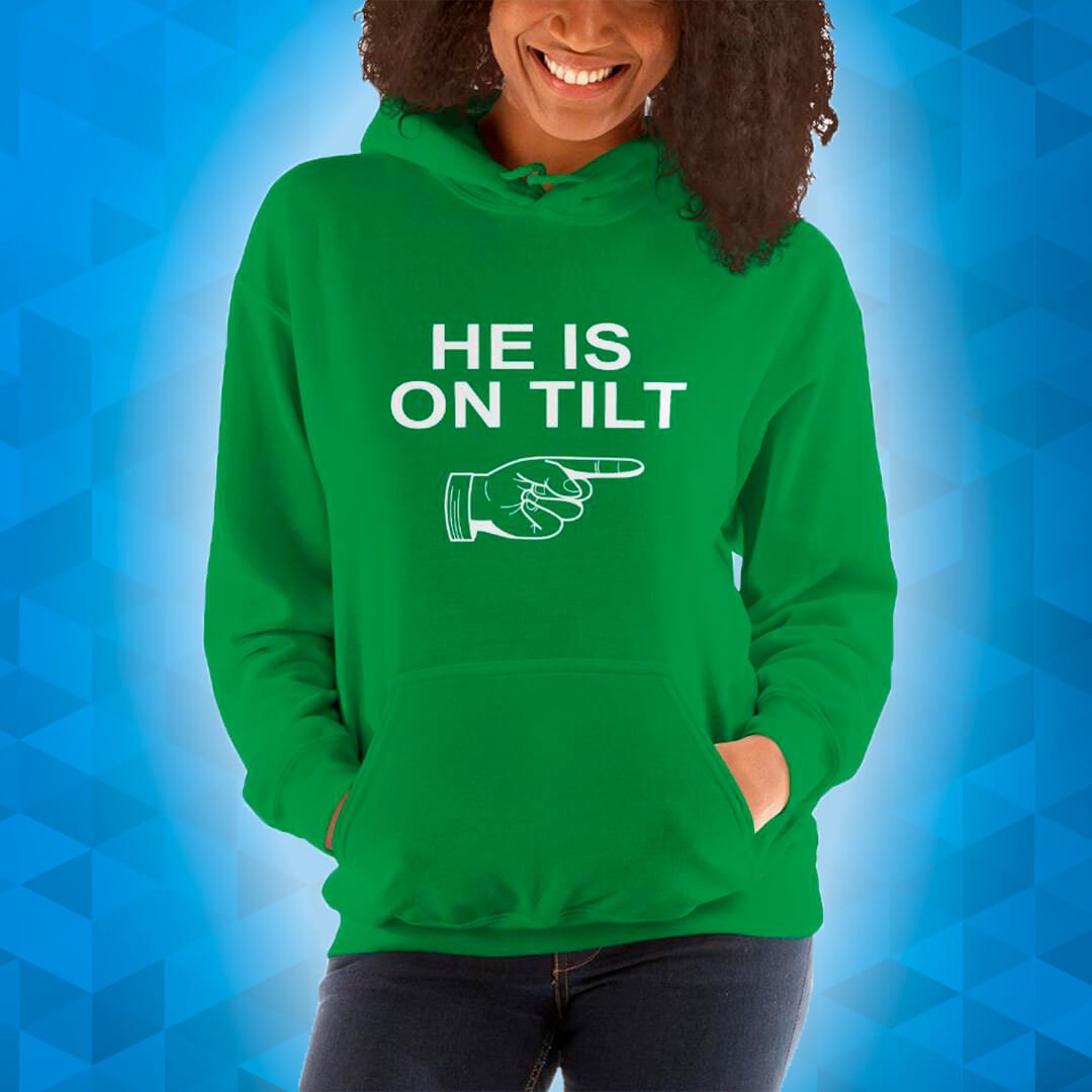 Woman with a green hoody with the text He is on tilt, with a hand that points to the right